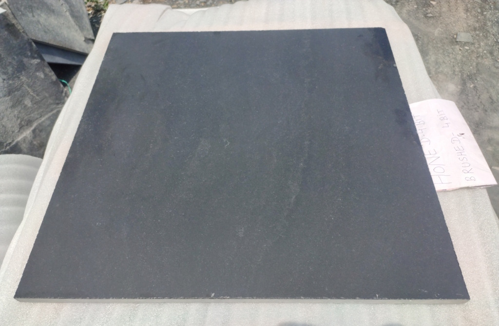 Lime-black-tile-in-polished-and-brushed-top-calibrated-bottom-machine-cut-MC-edges